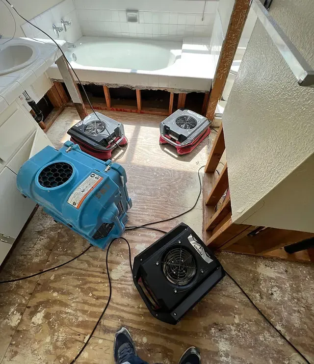 AC condensation overflow water damage on a Santee, CA ceiling